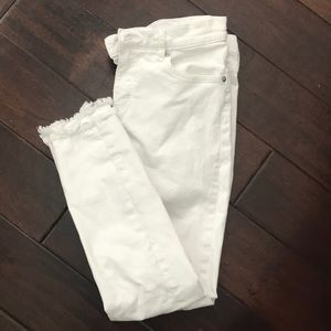 Skinny jeans. White denim. Frayed. This season.